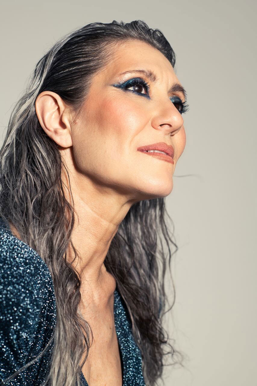 Grey hair model Valeria Sechi for Pharmacos' adv campaign.