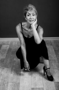 A black and white portrait of grey hair model Valeria Sechi