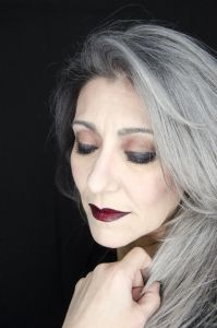 A face closeup of grey hair model Valeria Sechi 