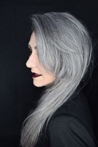 A face closeup of grey hair model Valeria Sechi 