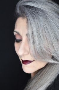 A face closeup of grey hair model Valeria Sechi 