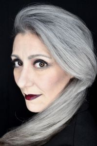 A face closeup of grey hair model Valeria Sechi 