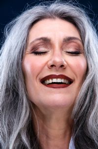 Face closeup of Italian grey hair model Valeria Sechi