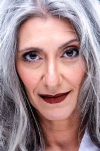 Face closeup of Italian grey hair model Valeria Sechi