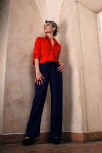 Grey hair model Valeria Sechi wearing a red fashion shirt