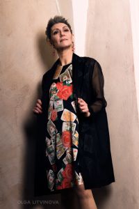 Grey hair model Valeria Sechi wearing dress with a playing cards fantasy