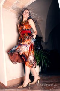 Grey hair model Valeria Sechi wearing fashion dress