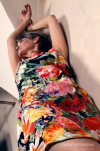 Grey hair model Valeria Sechi wearing fashion dress
