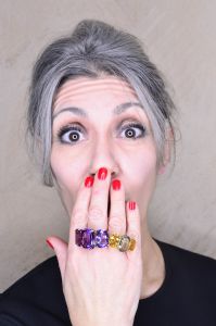 Grey hair model Valeria Sechi wearing jewels