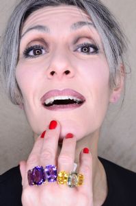 Grey hair model Valeria Sechi wearing jewels