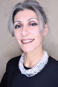 Grey hair model Valeria Sechi wearing jewels