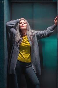 Italian grey hair model Valeria Sechi in knitwear