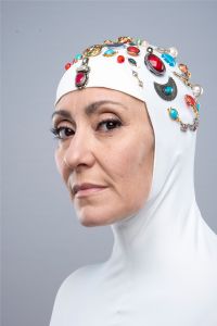 Italian grey hair model Valeria Sechi wearing a balaclava covered with jewels
