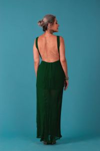 Italian grey hair model Valeria Sechi wearing a green dress