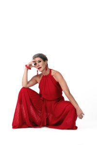 Italian grey hair model Valeria Sechi wearing a red dress