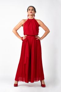 Italian grey hair model Valeria Sechi wearing a red dress