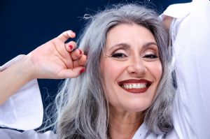 Portrait of Italian grey hair model Valeria Sechi with white shirt