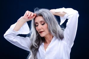 Portrait of Italian grey hair model Valeria Sechi with white shirt