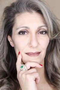 Valeria Sechi wearing an emerald ring